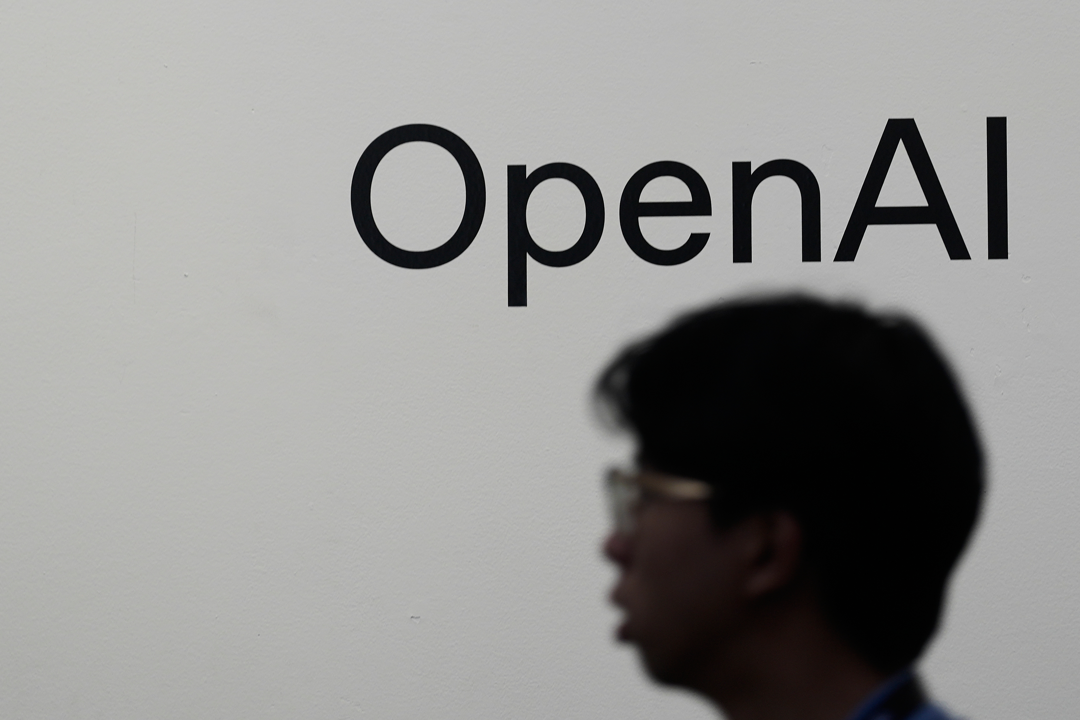 Attendees gather at the OpenAI DevDay 2026 conference, Tuesday, Sept. 29, 2026, in San Francisco. (AP Photo/Jeff Chiu)