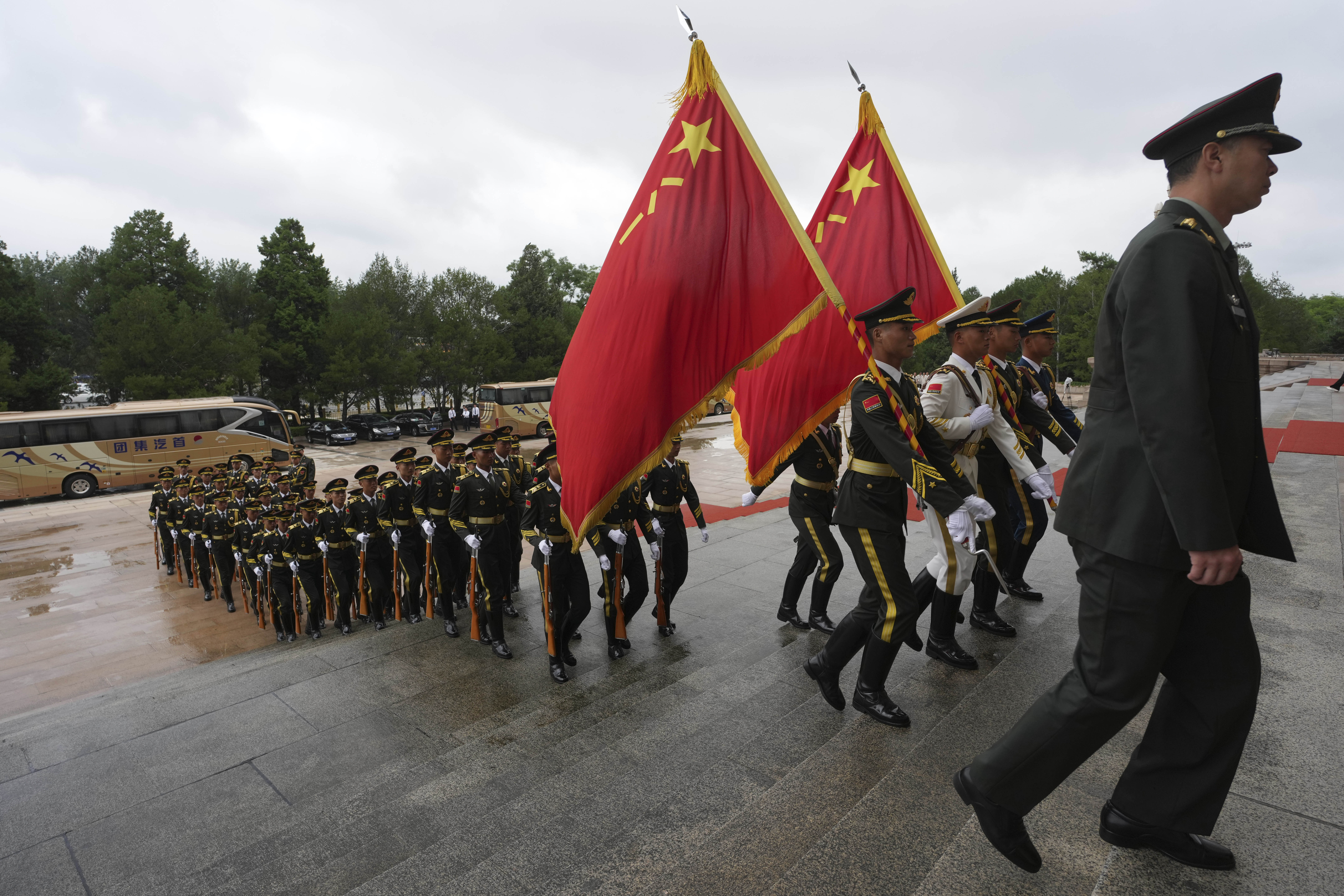 BEIJING, CHINA - JULY 10: A general view of parade on July 10, 2026 in Beijing, China. Chinese President Xi Jinping treated President of Namibia Netumbo Nandi-Ndaitwah to a welcome ceremony with a military band and children waving flags and flowers, held indoors due to rainy weather. (Photo by Ng Han Guan-China Pool/Getty Images)