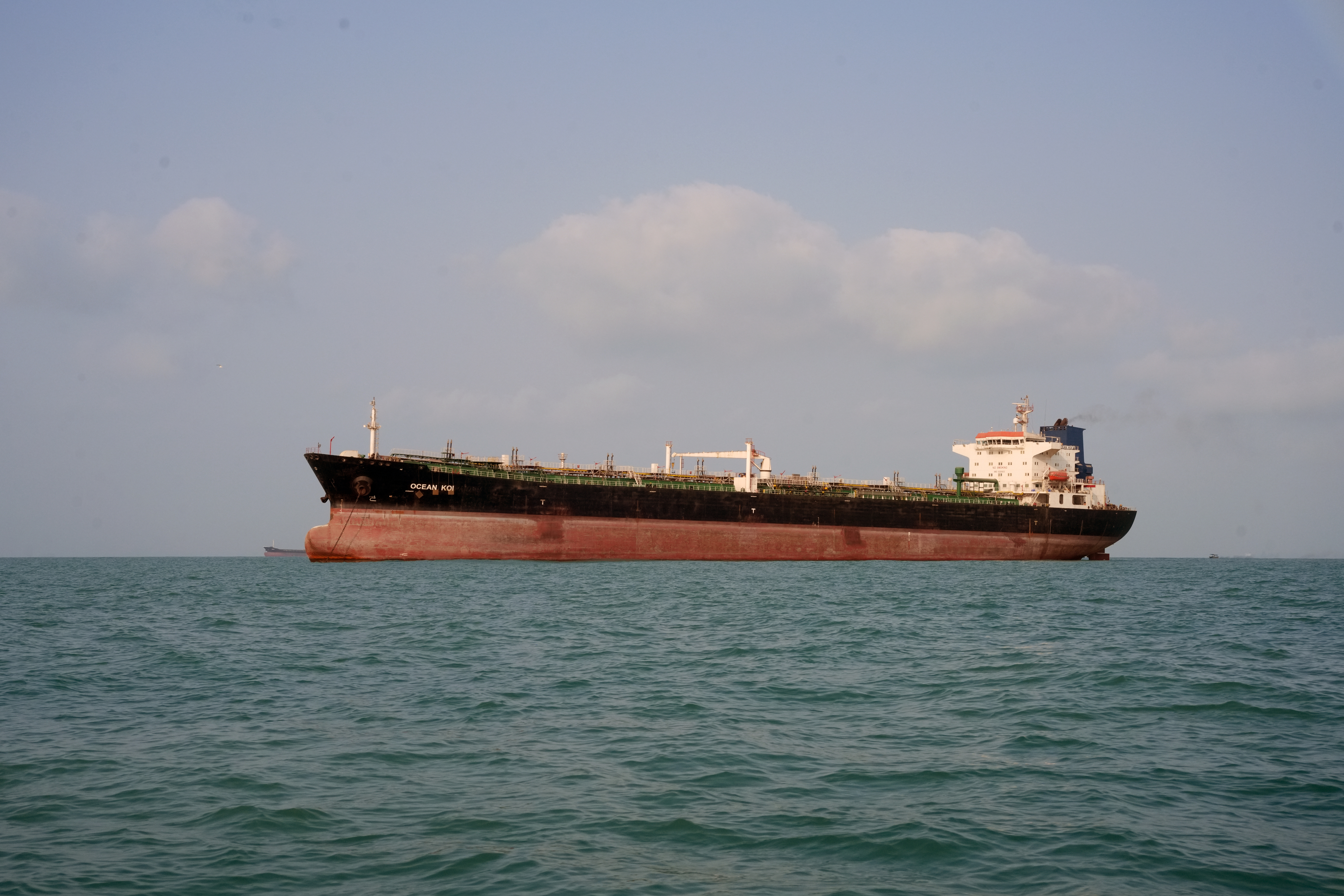 An oil products tanker is anchored in the Strait of Hormuz on August 10, 2026 off the coast of Bandar Abbas, Iran. [Ali Saeedi/Getty Images]