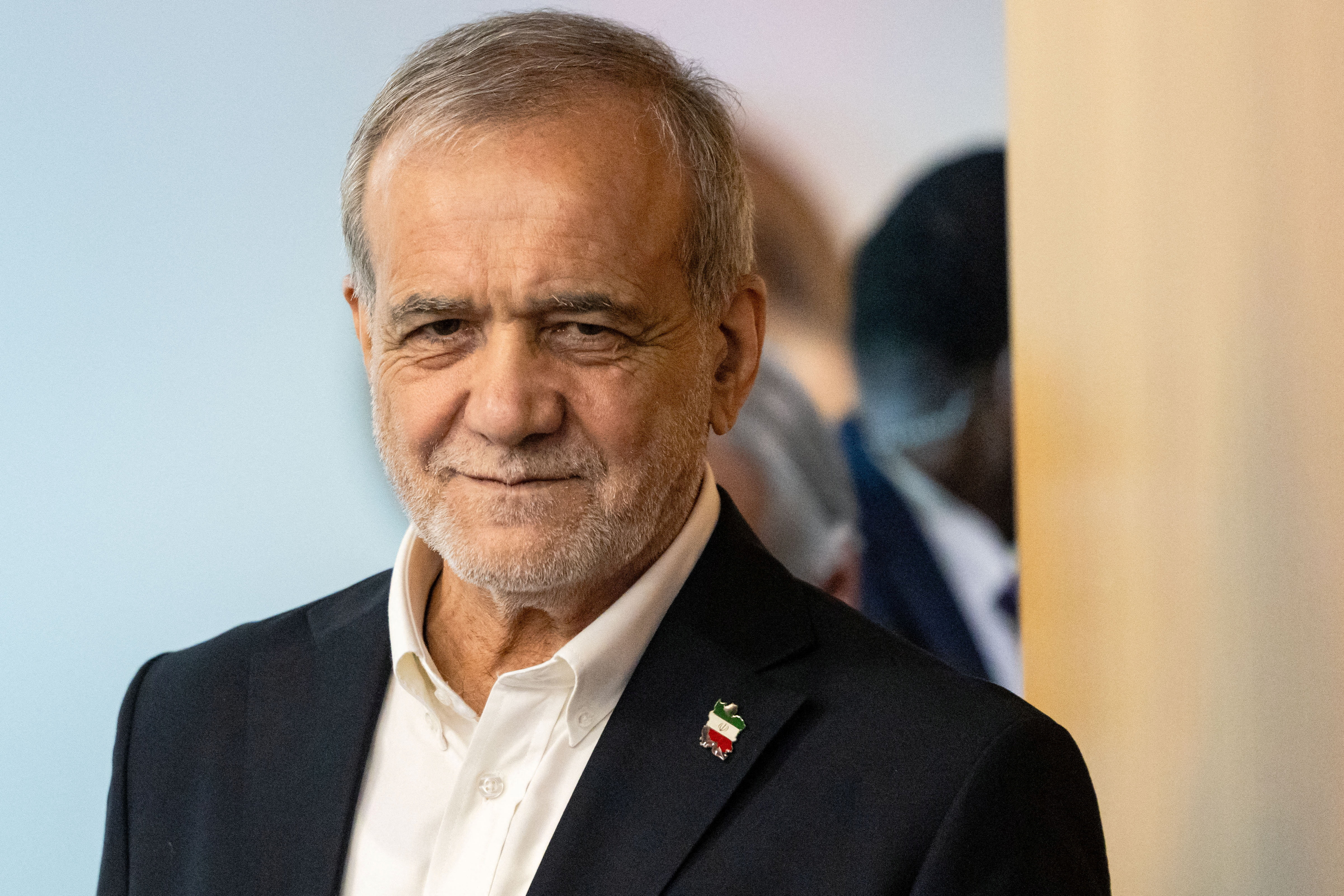 Iran's President Masoud Pezeshkian smiles.