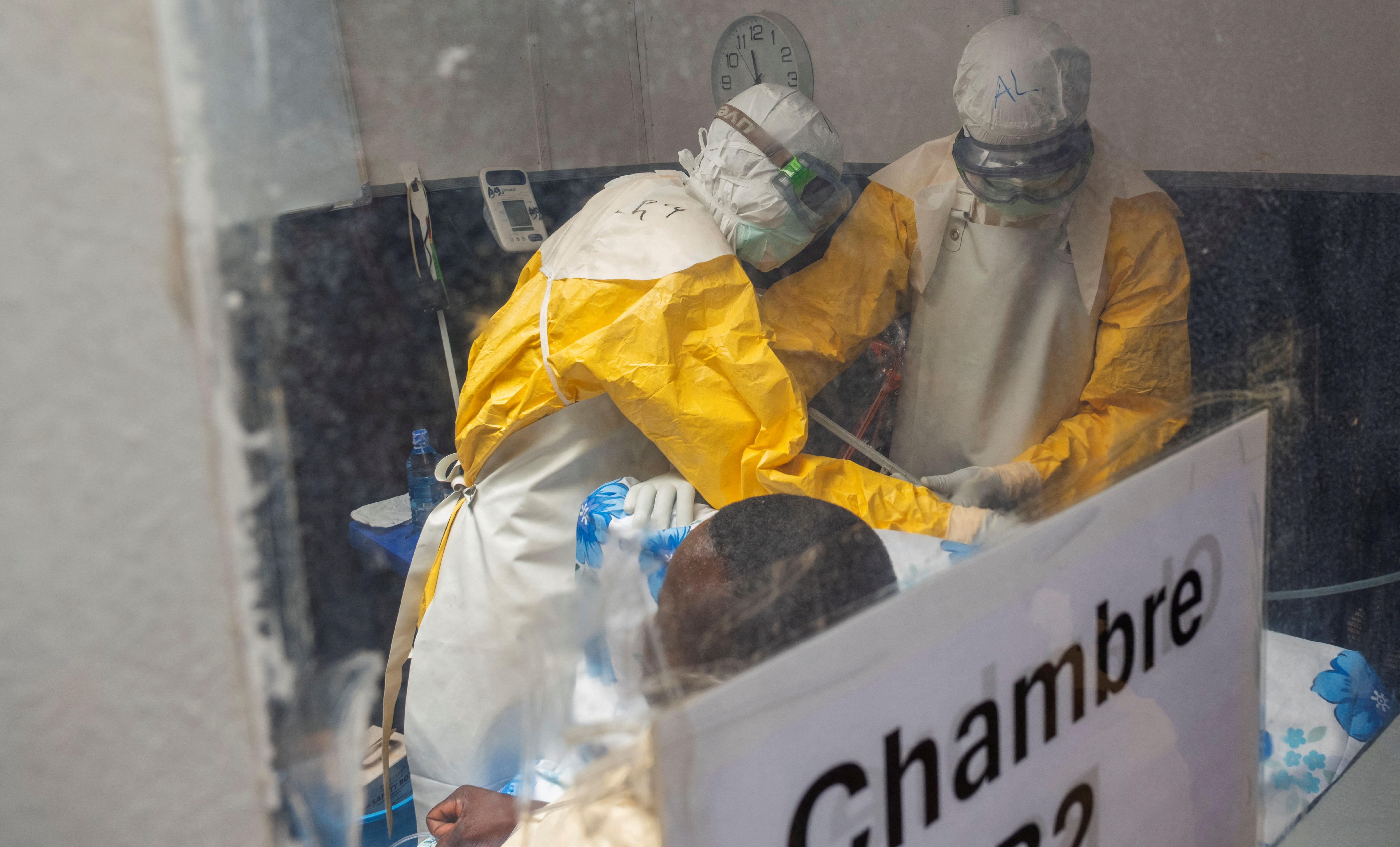 Medecins Sans Frontieres (MSF) doctors treat a patient inside the Kitatumba Ebola treatment center, as aid agencies intensify efforts to contain a new Ebola outbreak involving the Bundibugyo species, in Butembo, North Kivu province, Democratic Republic of Congo, September 23, 2026. REUTERS/Gradel Muyisa Mumbere