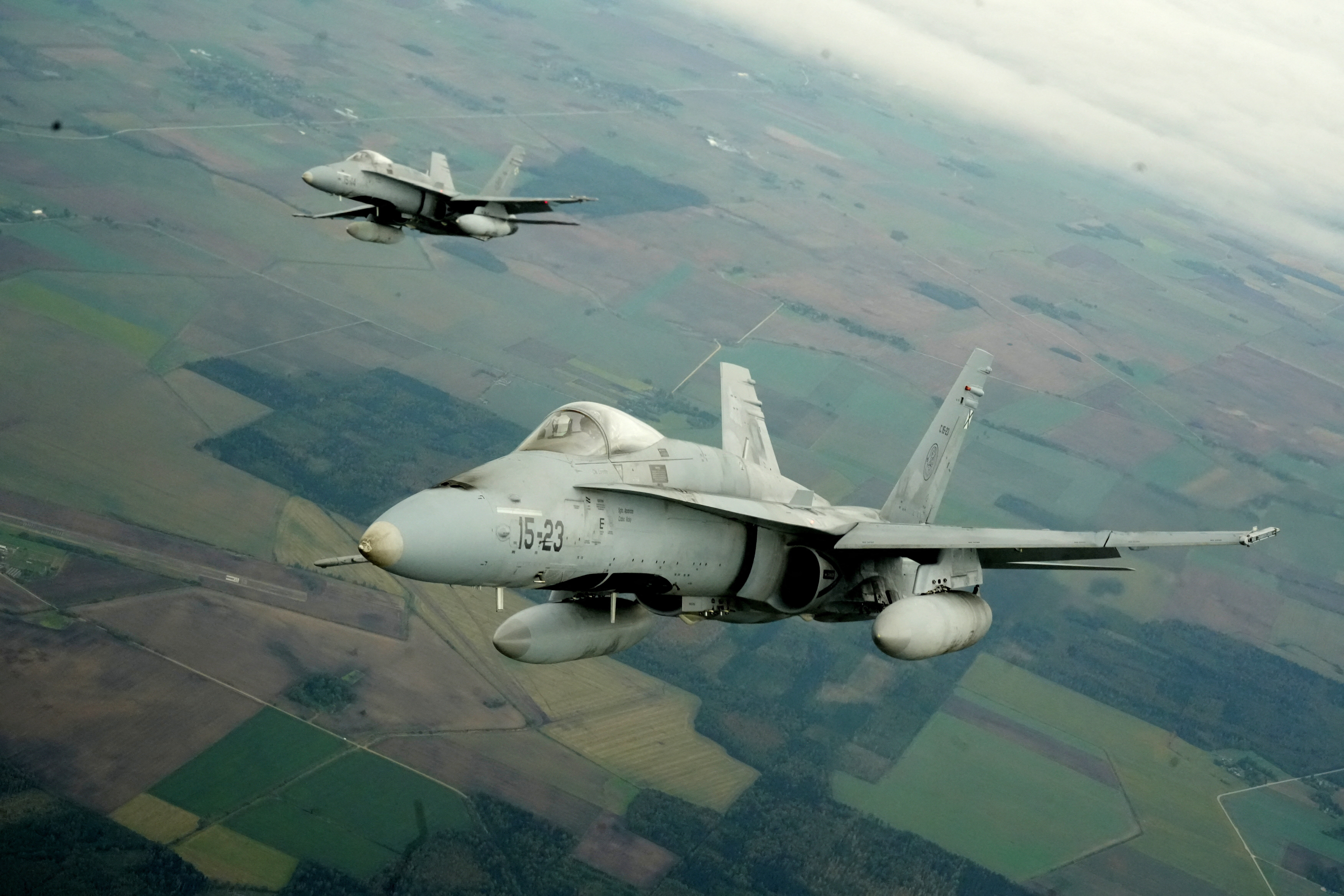 Spanish Air Force F-18 fighter jets fly over Lithuania during a NATO media tour in Siauliai Air Base, Lithuania, September 30, 2026. REUTERS/Ints Kalnins