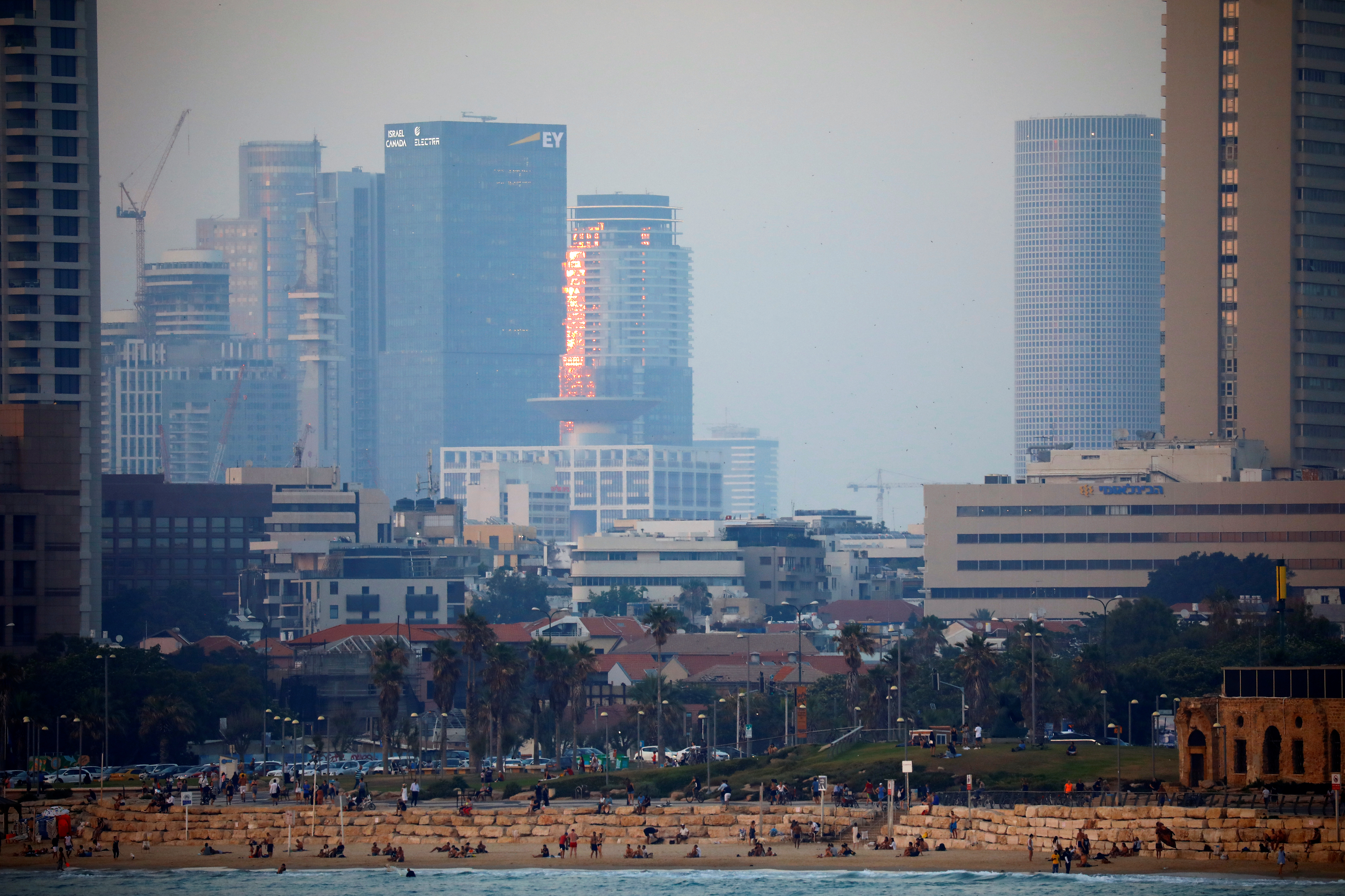 High-rise buildings are seen near a beach.