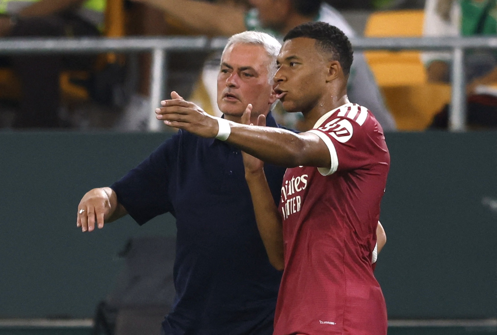 Real Madrid coach Jose Mourinho gives instructions to Real Madrid's Kylian Mbappe