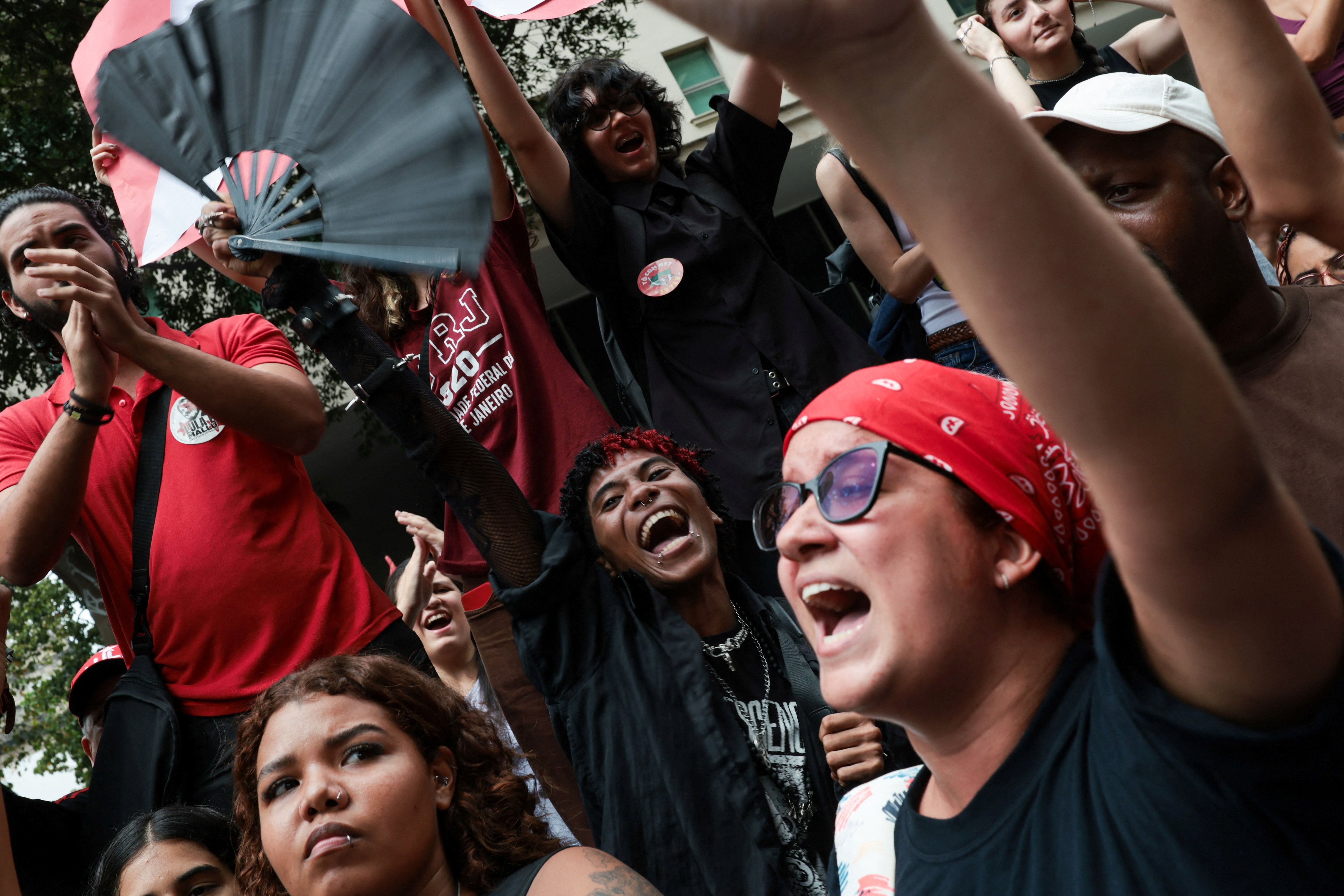 People take part in a protest by students against what organisers say is the growth of the far-right movement, ahead of the runoff of the Brazilian presidential election. [Tita Barros/Reuters]