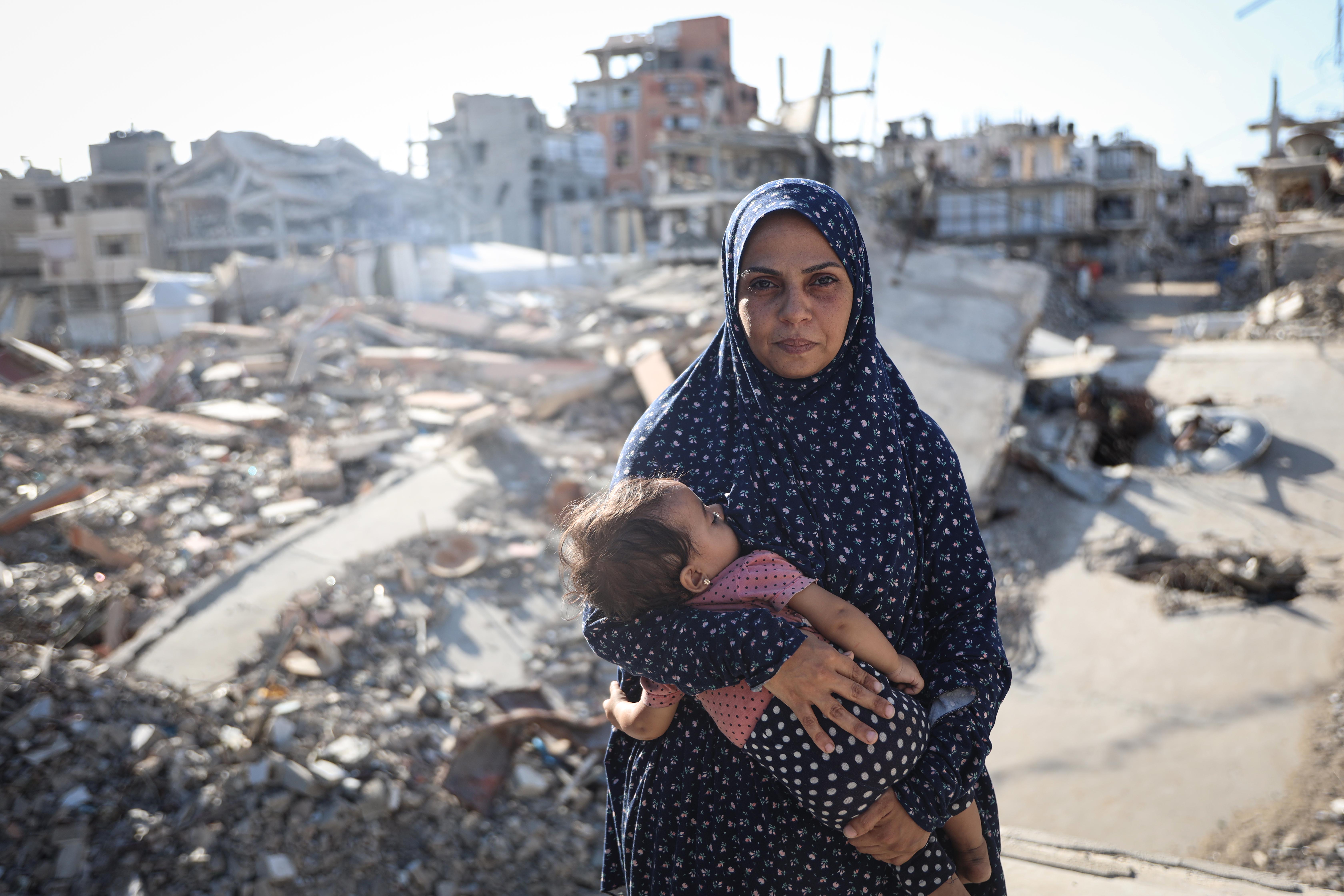 Nisreen Touman has lost two children during the war [Abdelhakim Abu Riash/Al Jazeera]