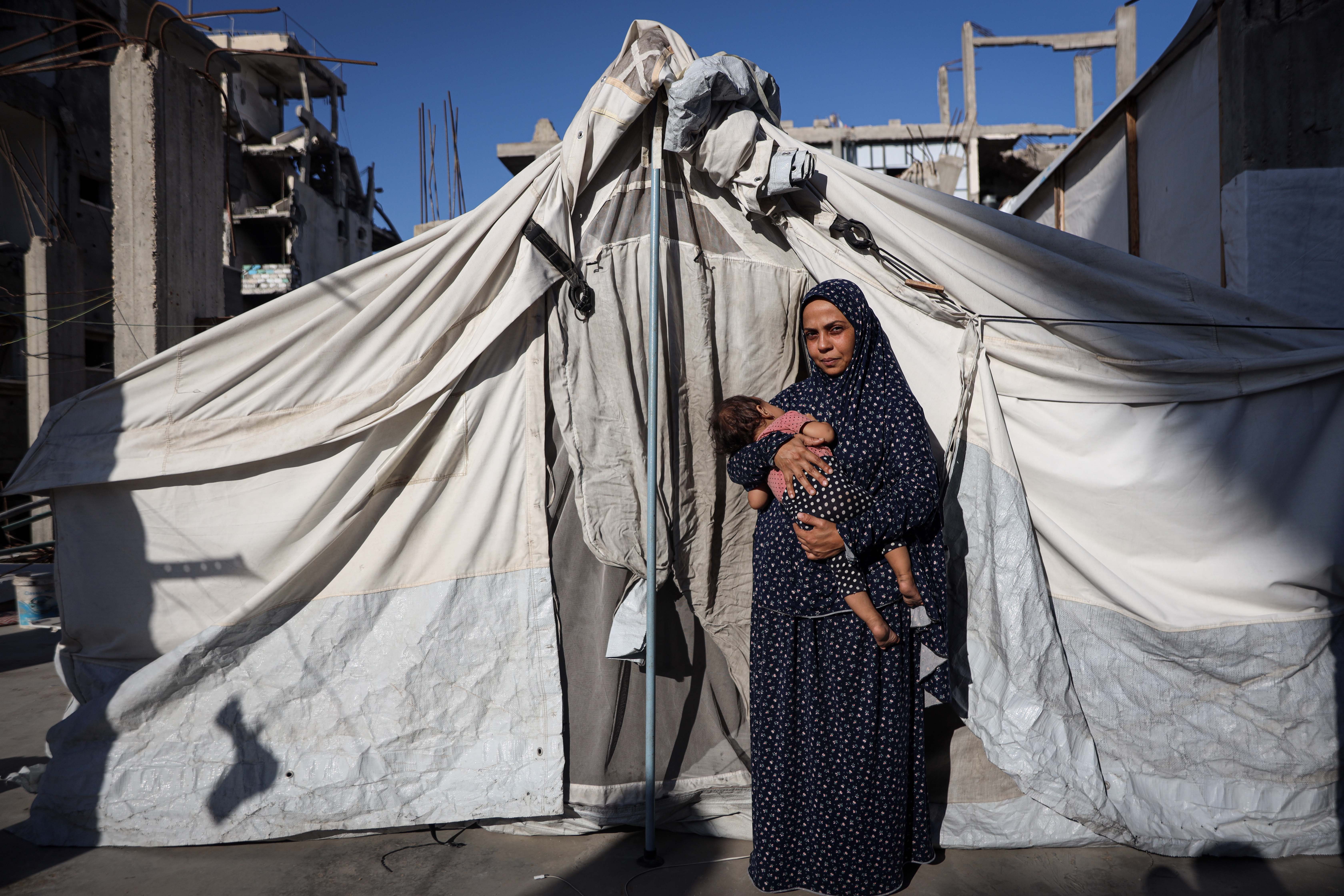 Nisreen now lives with Sidra at her family’s home in Gaza [do not use - Abdelhakim Abu Riash/Al Jazeera]