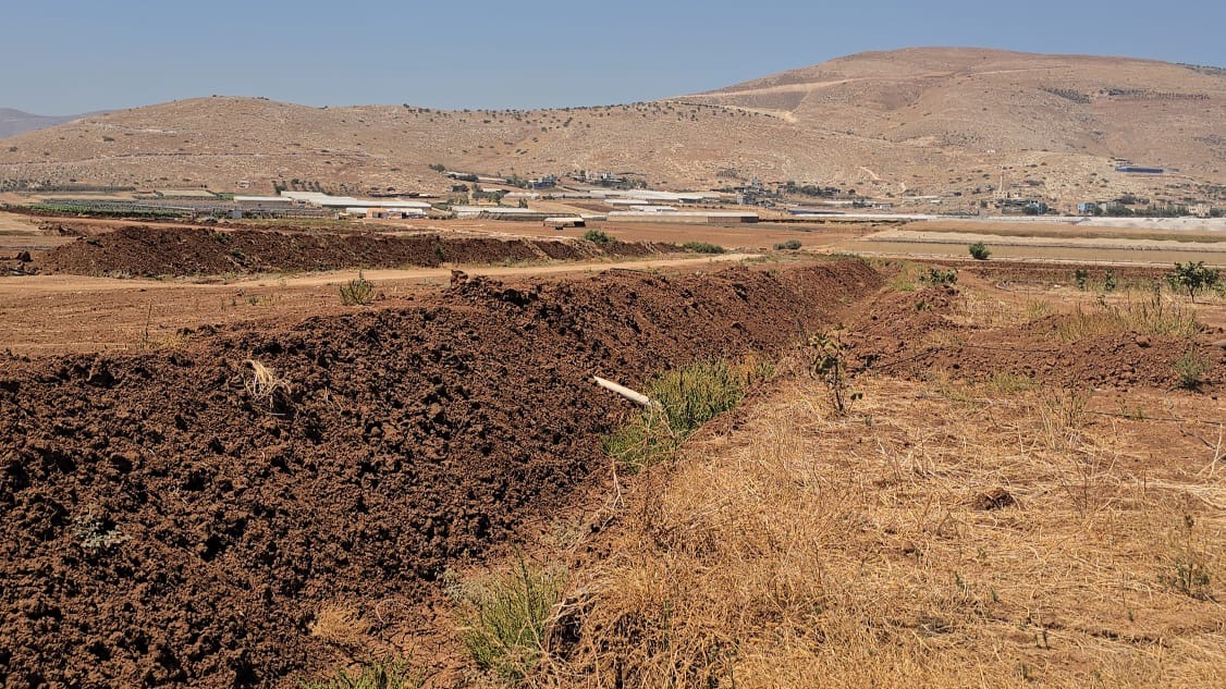 A trench dug by Israel around the Bedouin community to besiege the residents and restrict their movement.