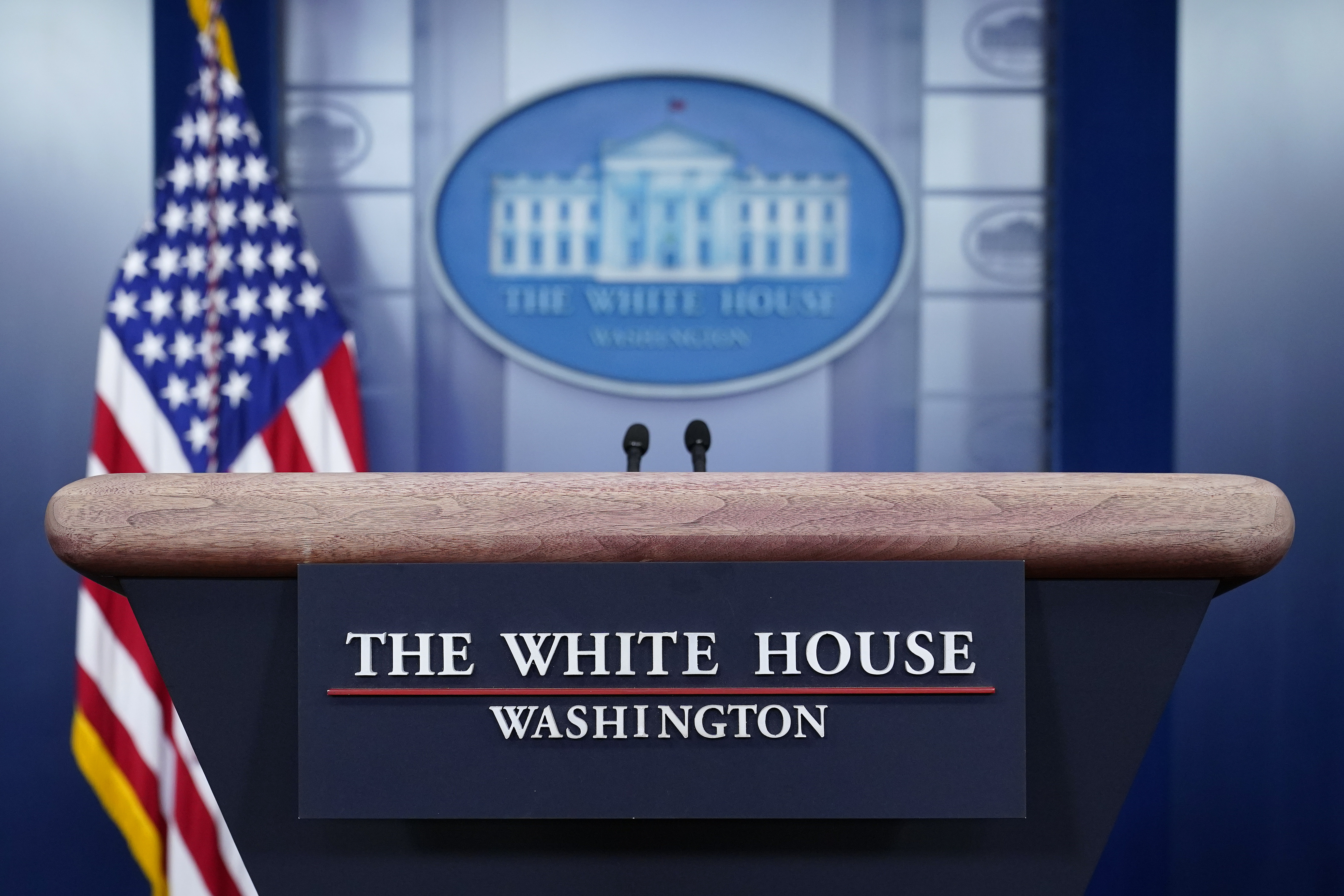 A plaque hangs from a lectern in the James Brady Press Briefing Room of the White House, Monday, Feb. 8, 2021, in Washington. (AP Photo/Patrick Semansky)