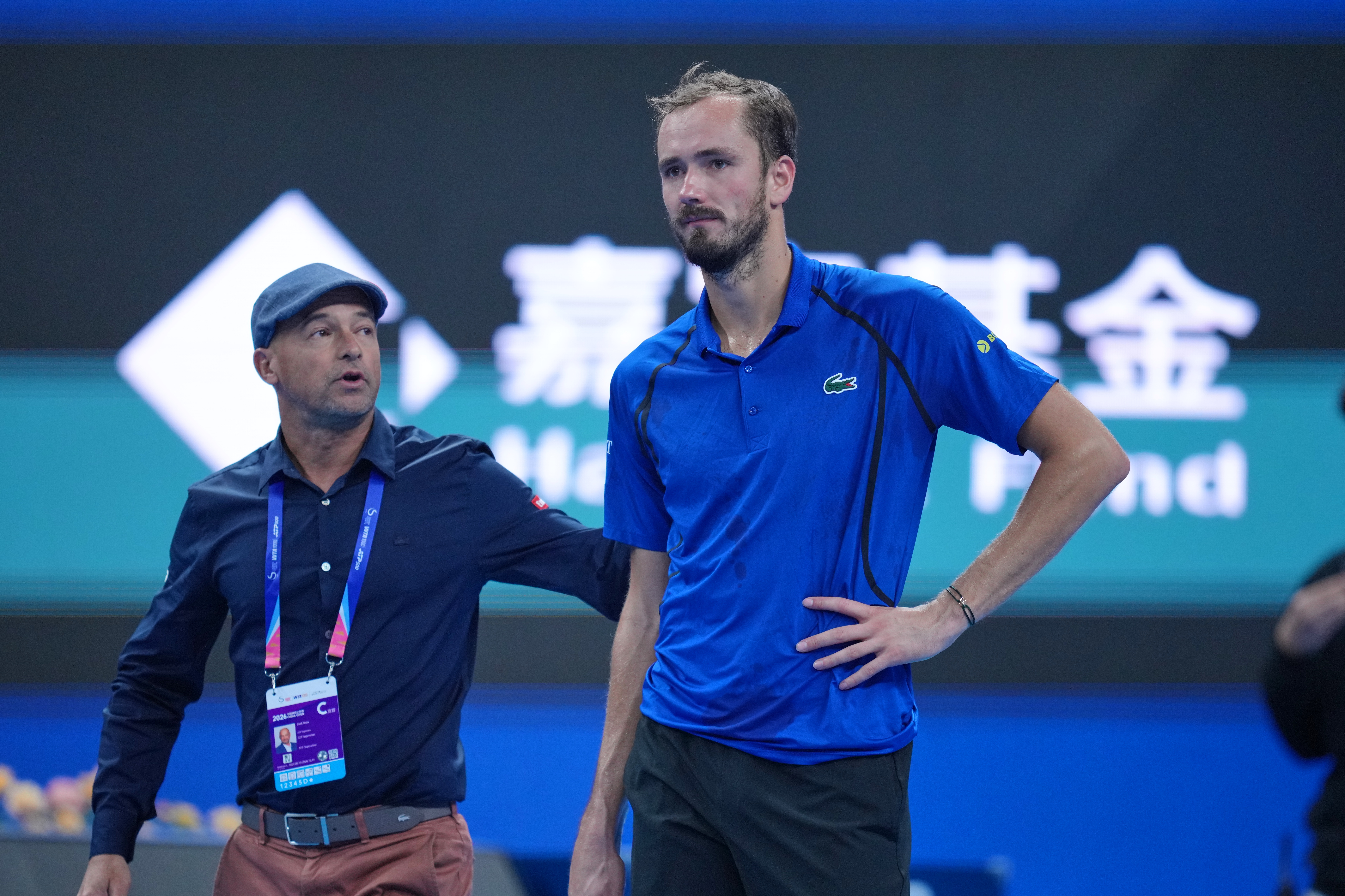 Daniil Medvedev, of Russia, looks on after being disqualified during a semi final match against Novak Djokovic, of Serbia at the China Open tennis tournament