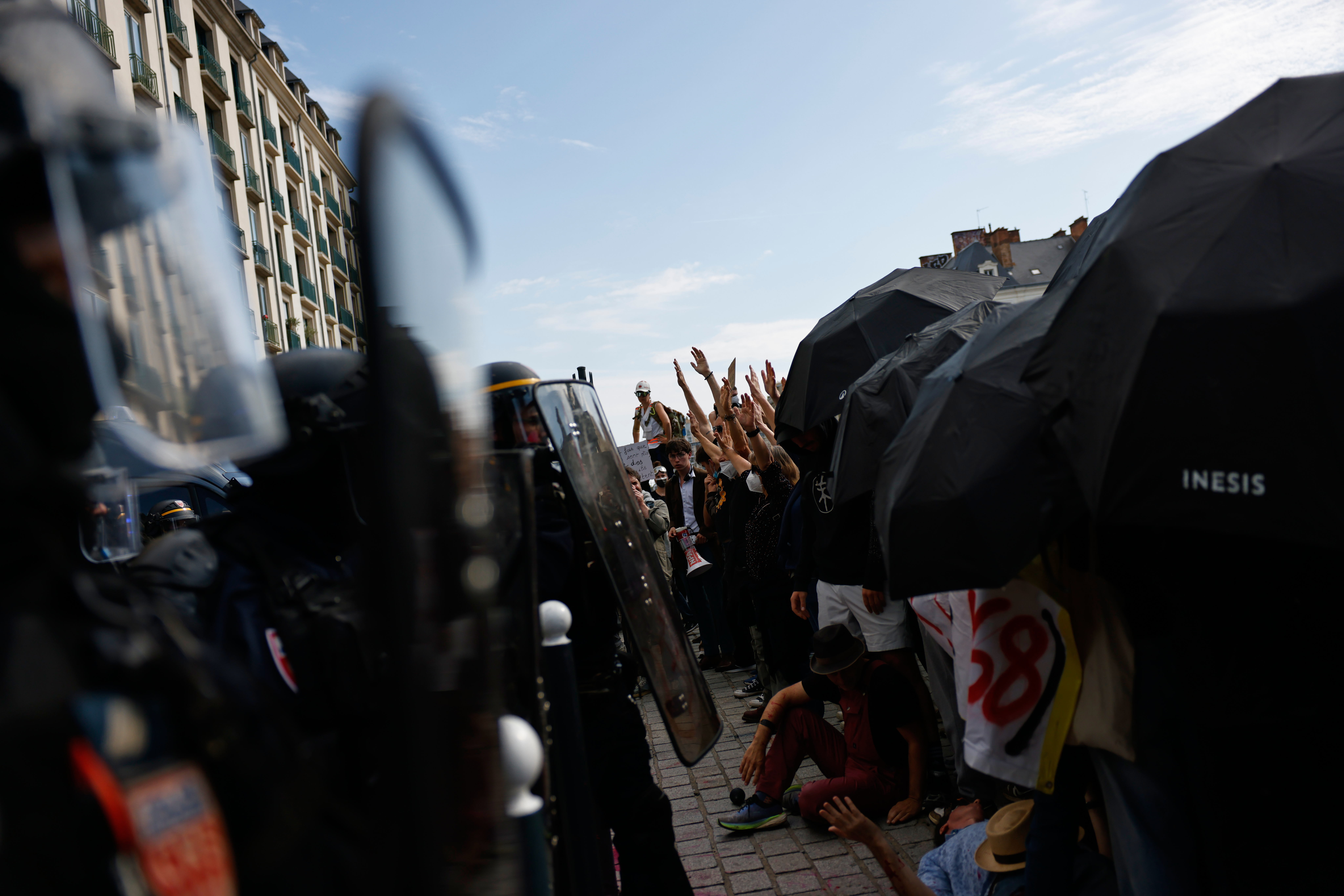 Riot police face students during a protest against under-resourced schools in Rennes, western France, on October 6, 2026