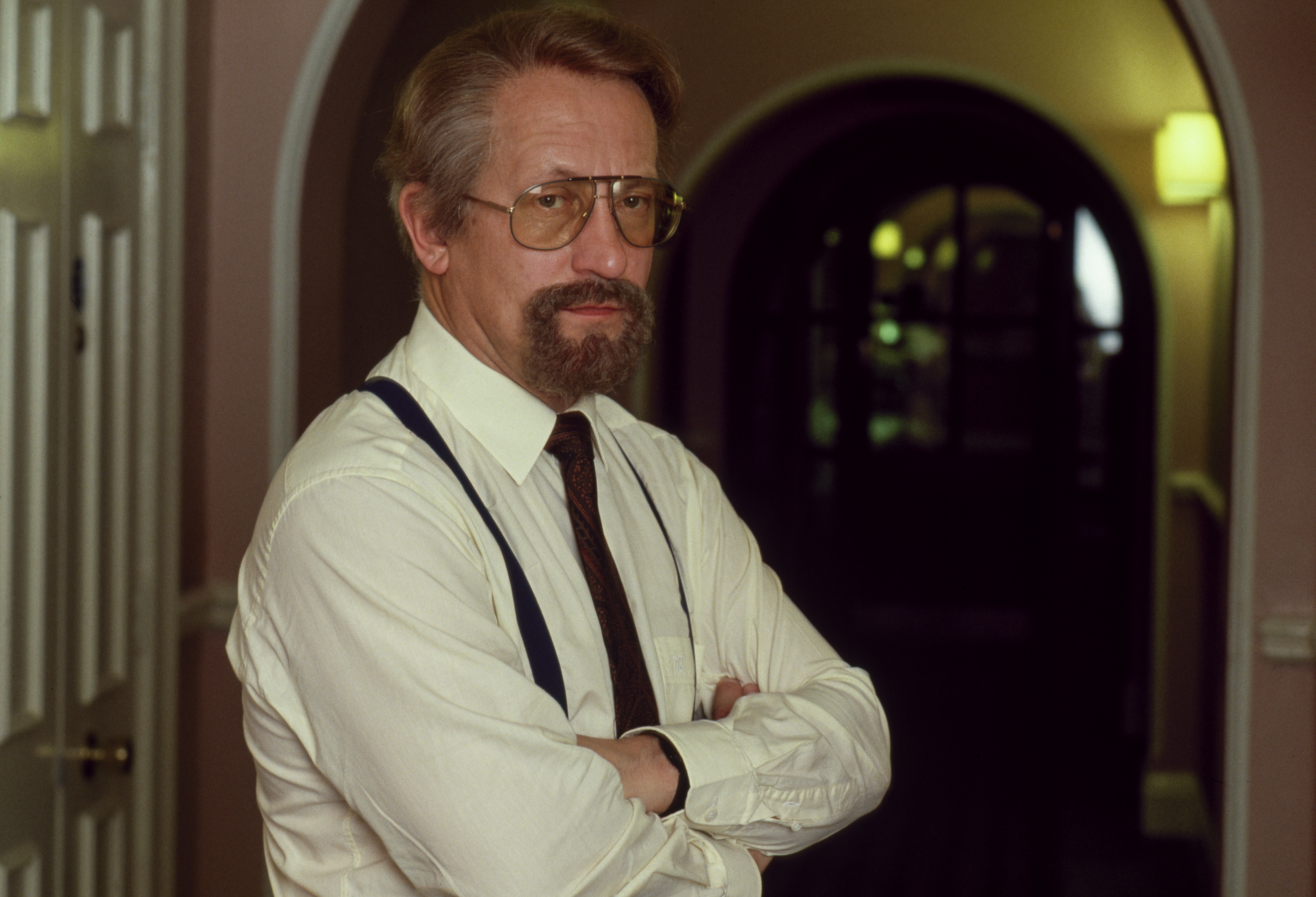 Oleg Gordievsky, the KGB Colonel turned British spy, is seen here in disguise, in the Marlborough Hotel in London, on October 16, 1990. Gordievsky was in hiding after the former KGB Colonel and KGB station chief in London, was uncovered as a British spy for M16. He escaped to the west from Moscow in 1985. He arrived for this exclusive photo shoot wearing a wig, false beard and glasses. (Photo by David Levenson/Getty Images)"n
