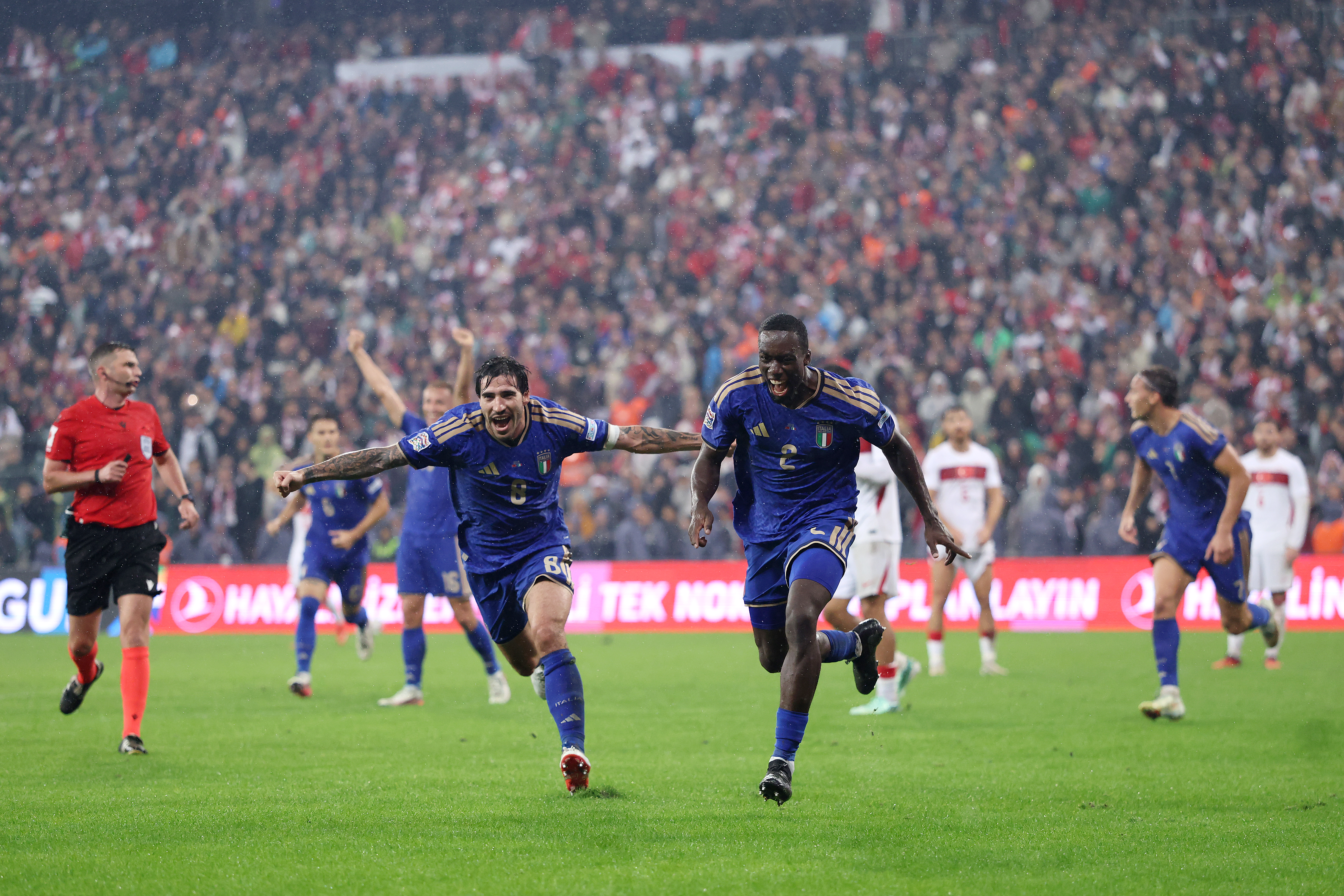 BURSA, TURKEY - SEPTEMBER 28: Michael Kayode of Italy celebrates scoring his team’s third goal with teammate Sandro Tonali during the UEFA Nations League 2026/27 group phase match between Türkiye and Italy at Atatürk Spor Kompleksi Matli Stadyumu on September 28, 2026 in Bursa, Turkey. (Photo by Ahmad Mora/Getty Images)