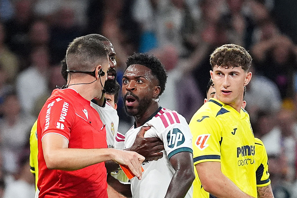 Vinicius Junior of Real Madrid receives a red card against Villarreal