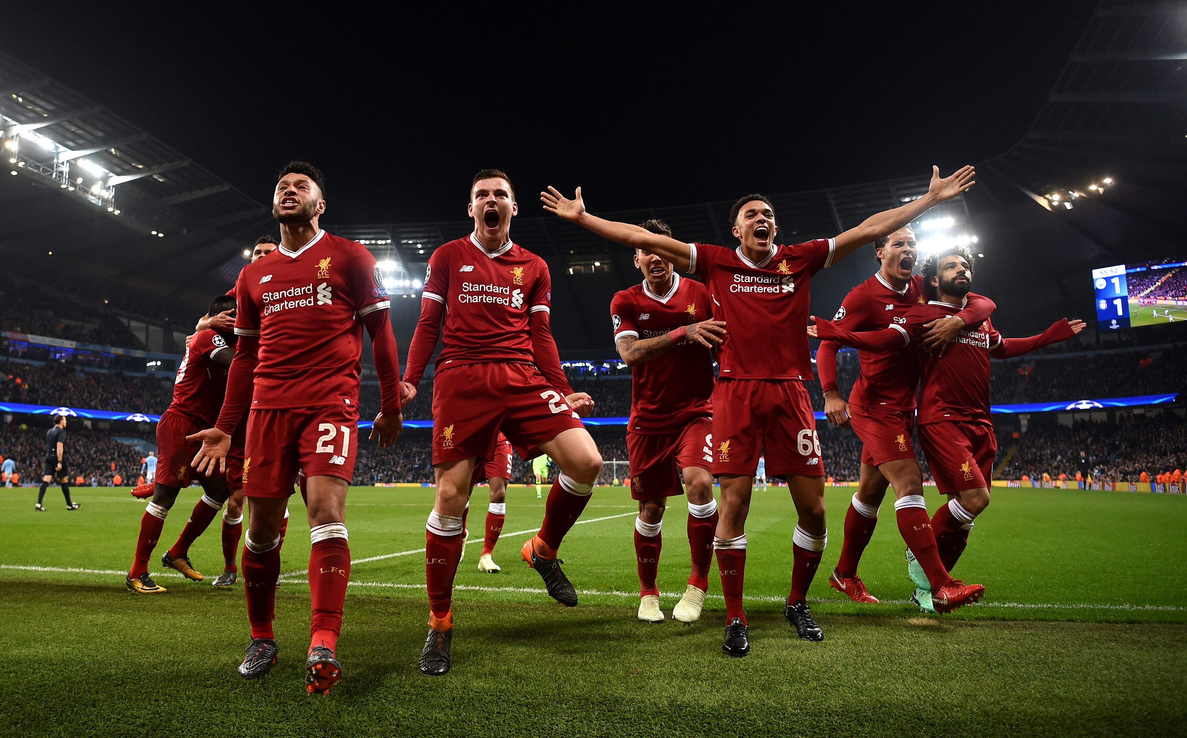 MANCHESTER, ENGLAND - APRIL 10: The Liverpool players celebrates after their sides first goal during the UEFA Champions League Quarter Final Second Leg match between Manchester City and Liverpool at Etihad Stadium on April 10, 2018 in Manchester, England. (Photo by Laurence Griffiths/Getty Images,)