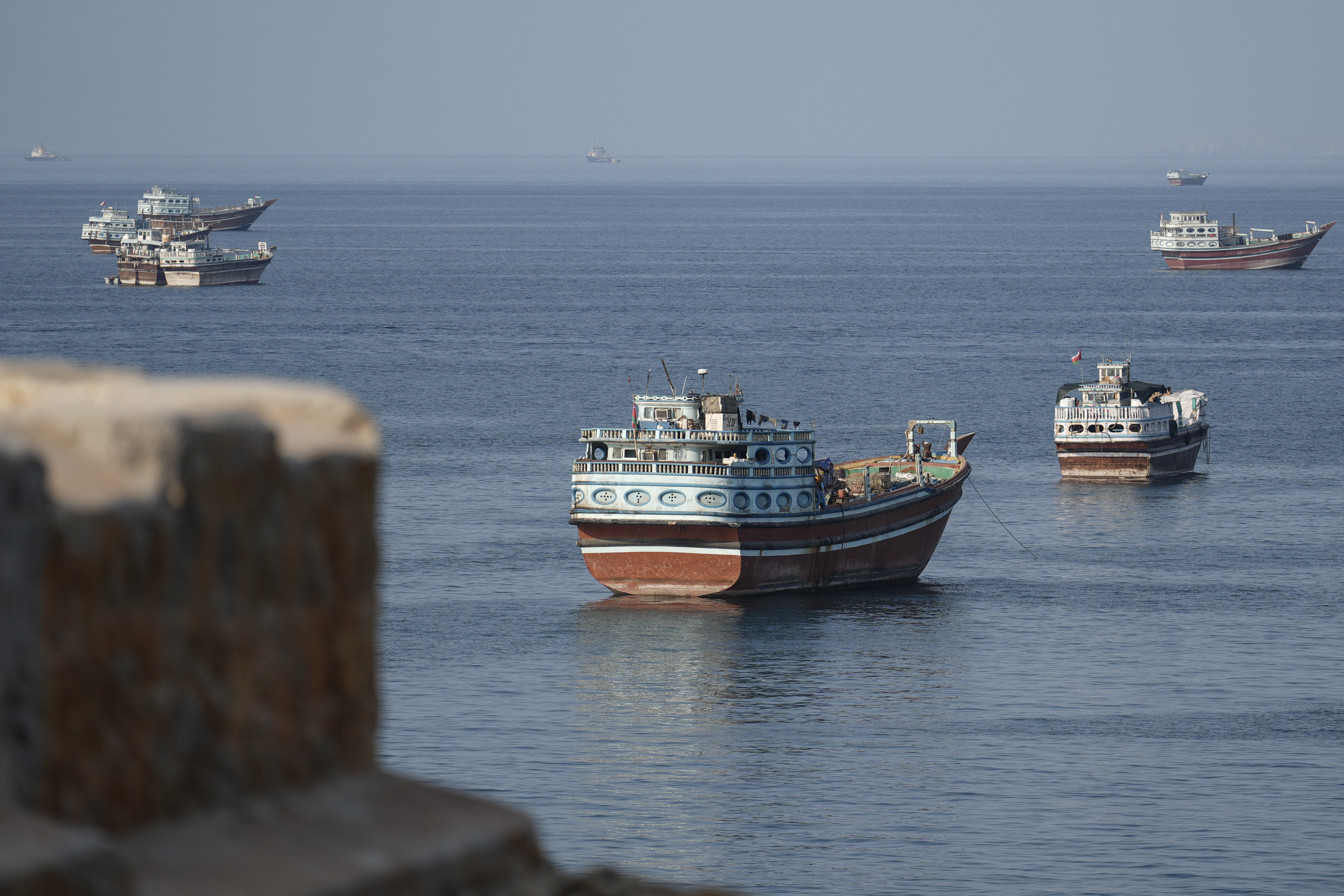 Ships anchored off the coast of Khasab in Oman’s Musandam governorate, near the Strait of Hormuz