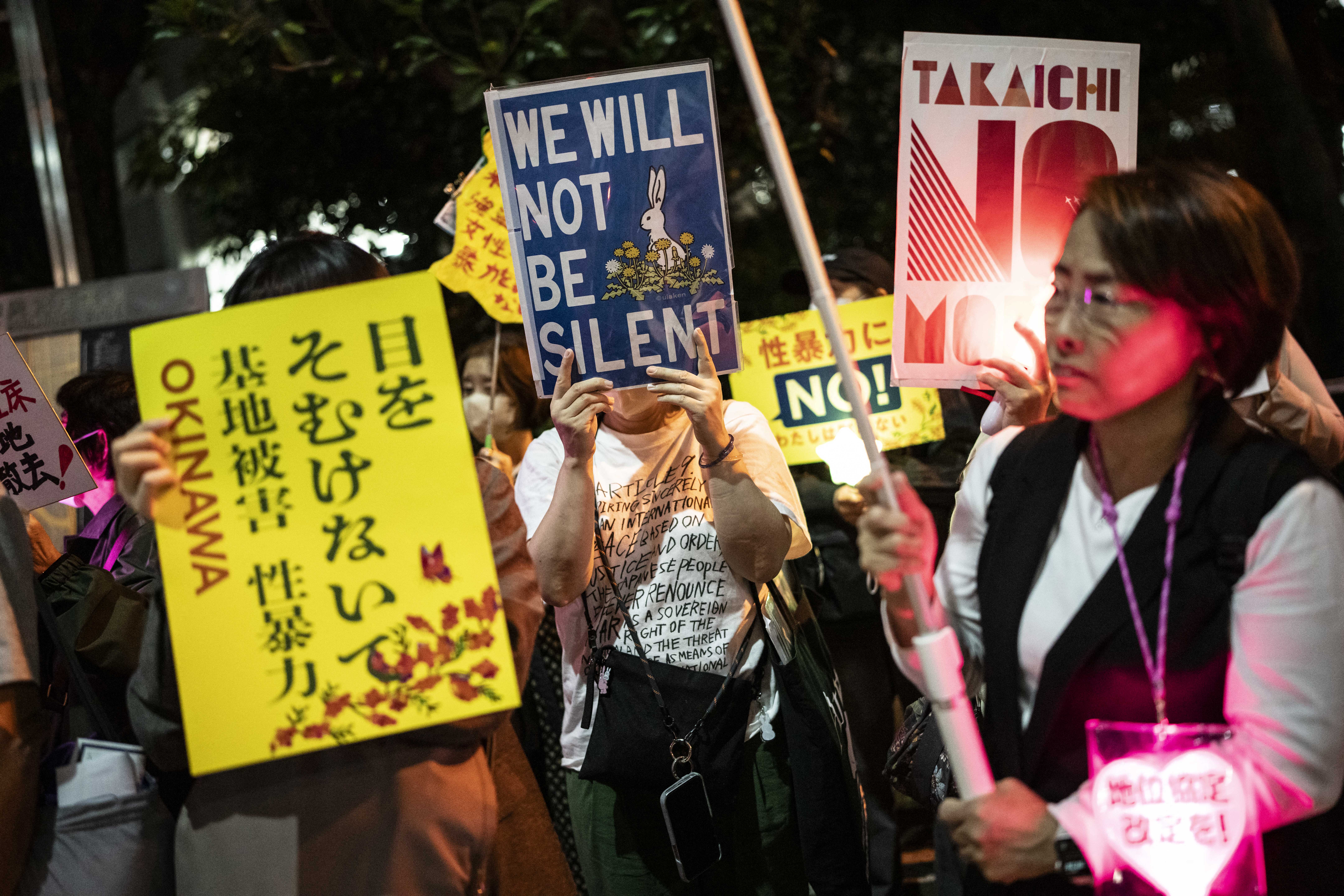 People protest against the killing of a woman in Okinawa allegedly committed by a US Marine Corps member, in front of the Prime Minister's Office in Tokyo on October 5, 2026.