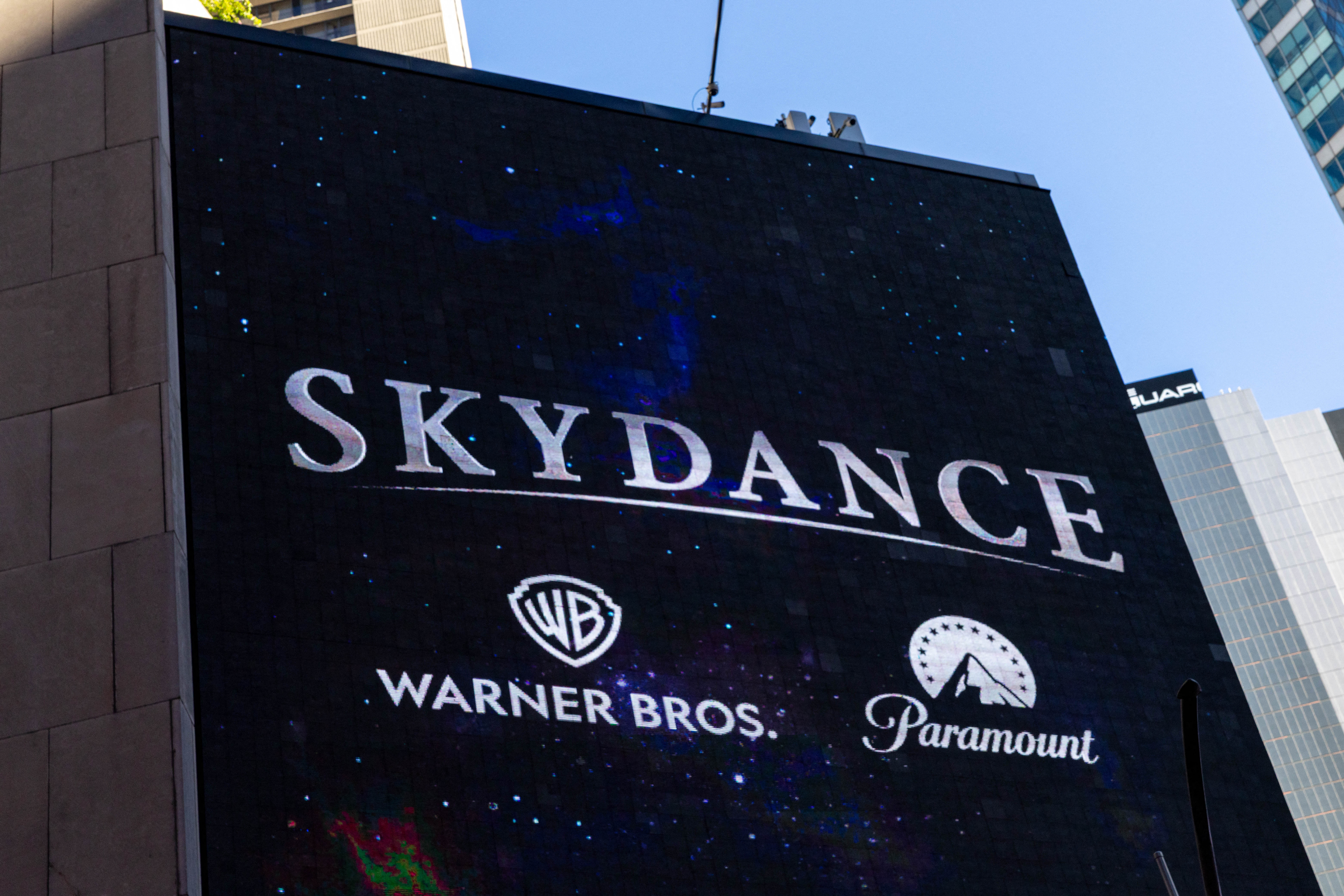 NEW YORK, NEW YORK - OCTOBER 6: A Skydance billboard outside of Paramount Global headquarters in Times Square, on October 6, 2026 in New York, New York. Paramount's $110 billion acquisition of Warner Bros. Discovery closed Tuesday. The new company is called Skydance and trades under the ticker "SKYD." Adam Gray/Getty Images/AFP (Photo by Adam Gray / GETTY IMAGES NORTH AMERICA / Getty Images via AFP)