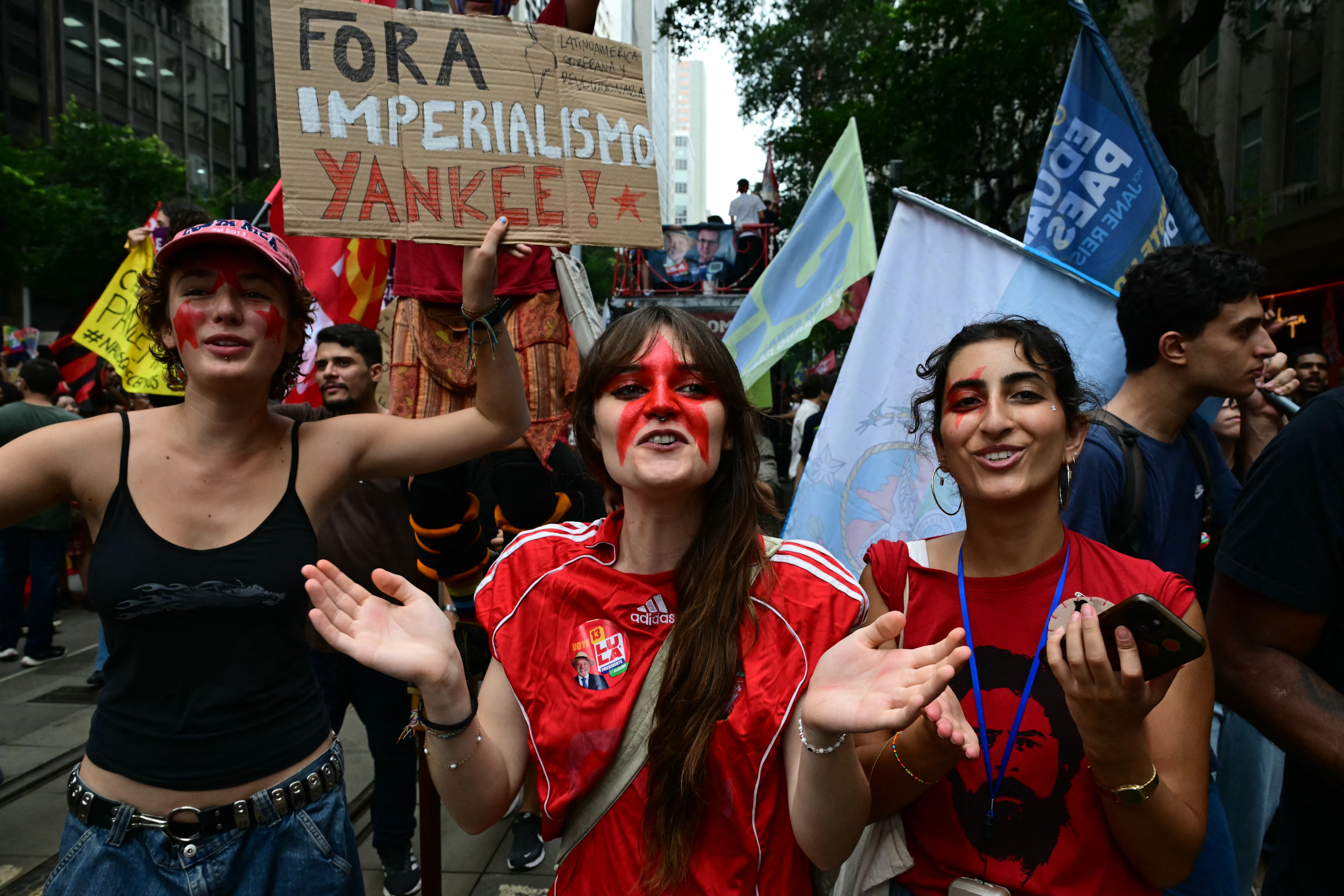 Students backing Brazil's President and presidential candidate Luiz Inacio Lula da Silva for the runoff election shout slogans during a march against the far right, in Rio de Janeiro, Brazil on October 7, 2026.