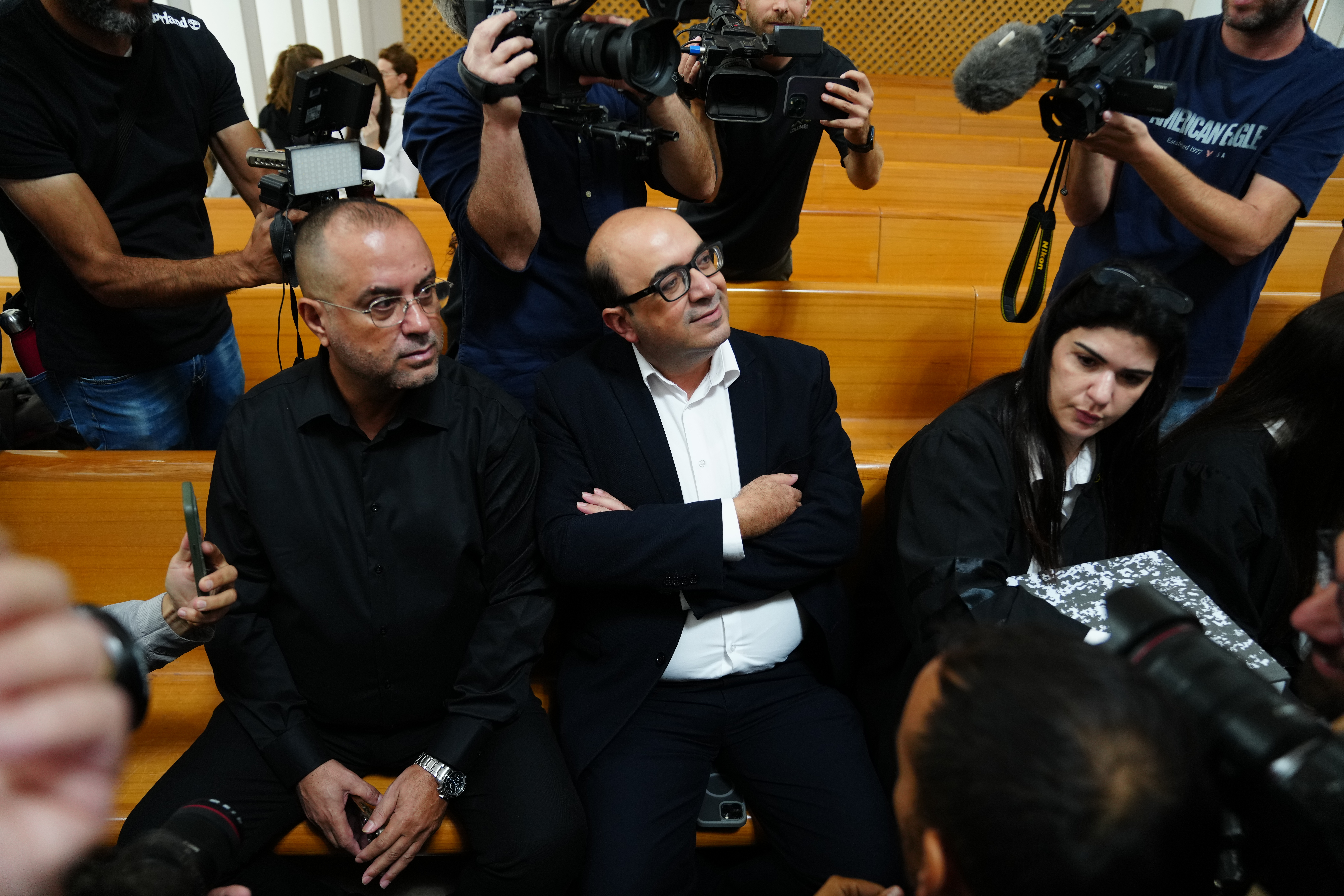 Nationalist Balad party leader Sami Abu Shehadeh, center, attends a hearing at Israel's Supreme Court on his electoral eligibility and that of two leading Arab parties, in Jerusalem, Thursday, Oct. 1, 2026. (AP Photo/Mahmoud Illean)