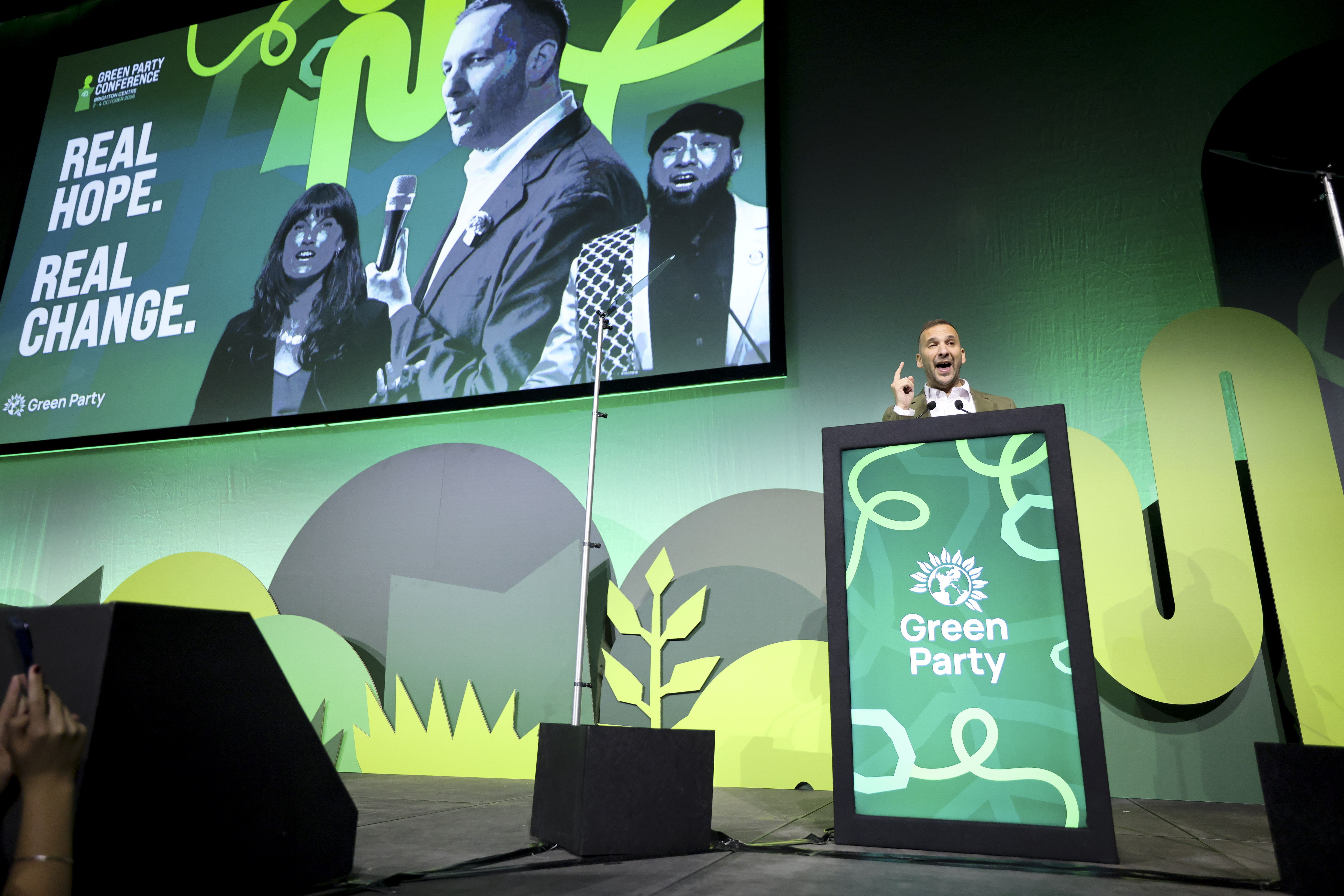 epa13277334 Leader of the Green Party of England and Wales, Zack Polanski, delivers his keynote speech at the Green Party annual conference in Brighton, Britain, 02 October 2026. EPA/ANDY RAIN