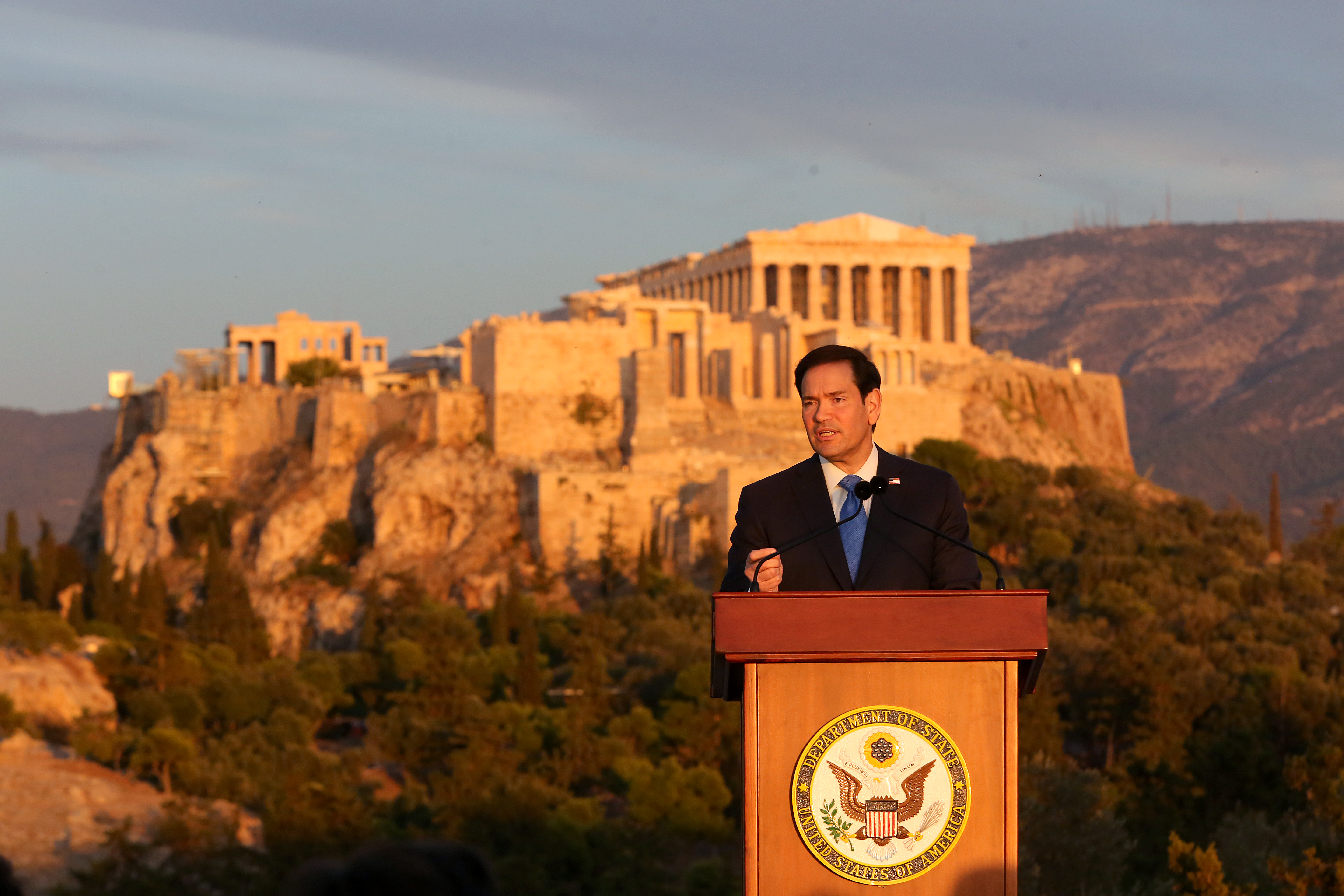 epa13287723 US Secretary of State Marco Rubio delivers a speech on the Pnyx hill with the Acropolis in the background in Athens, Greece, 07 October 2026. Rubio is visiting Athens for the launch of the 6th Greece-US Strategic Dialogue, focusing on defense, energy, and regional cooperation. EPA/ALEXANDROS VLACHOS