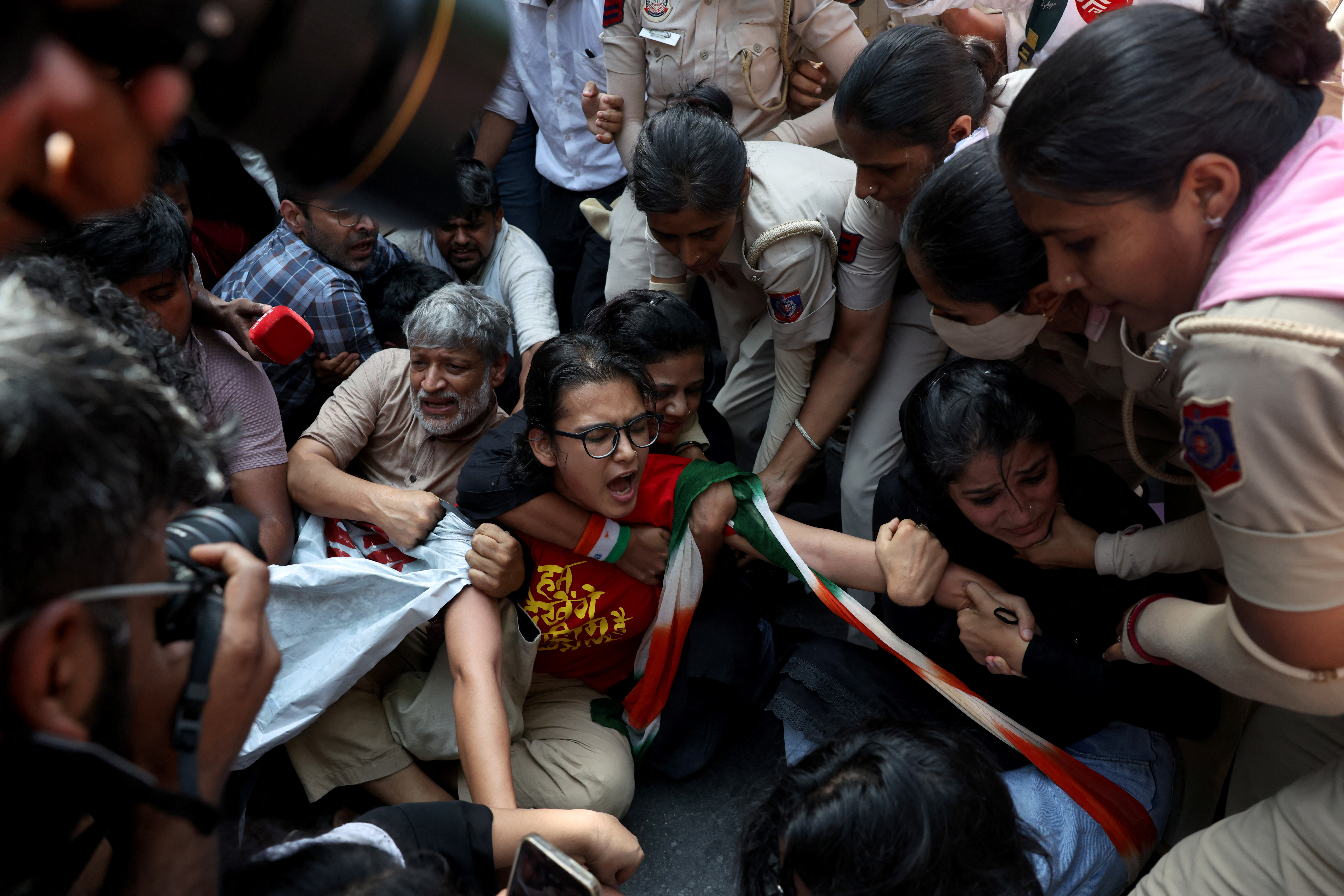 Neha Bora, National President of the All India Students' Association (AISA), reacts as she is detained by police during a protest demanding the resignation of India's Chief Election Commissioner Gyanesh Kumar, in New Delhi, India, October 2, 2026. REUTERS/Bhawika Chhabra